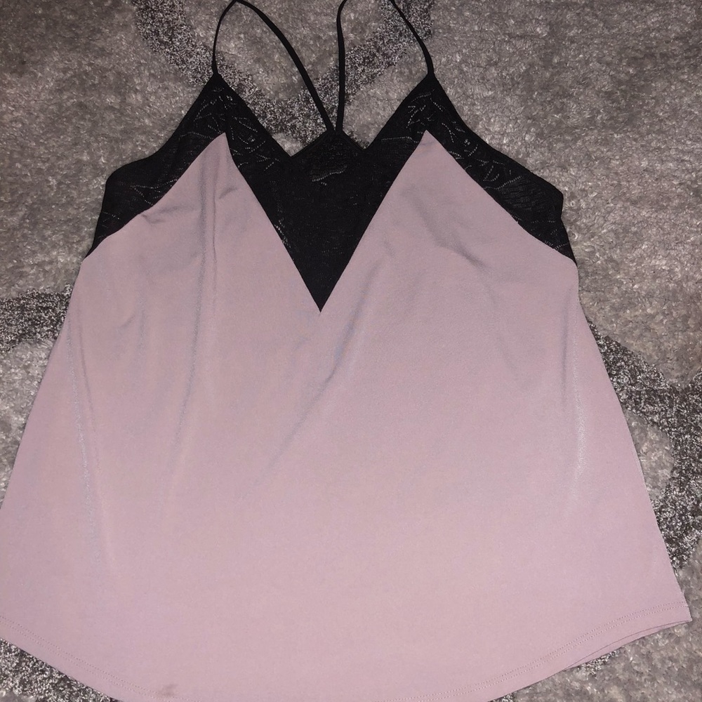 Pink and black Express top with lace detail.